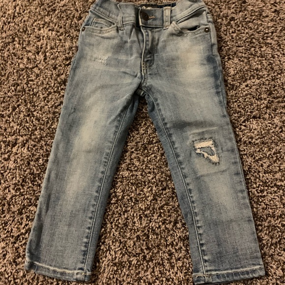 light blue cut jeans